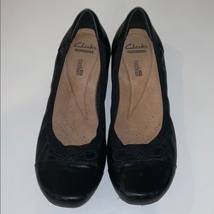 Clark’s black leather ballet flats